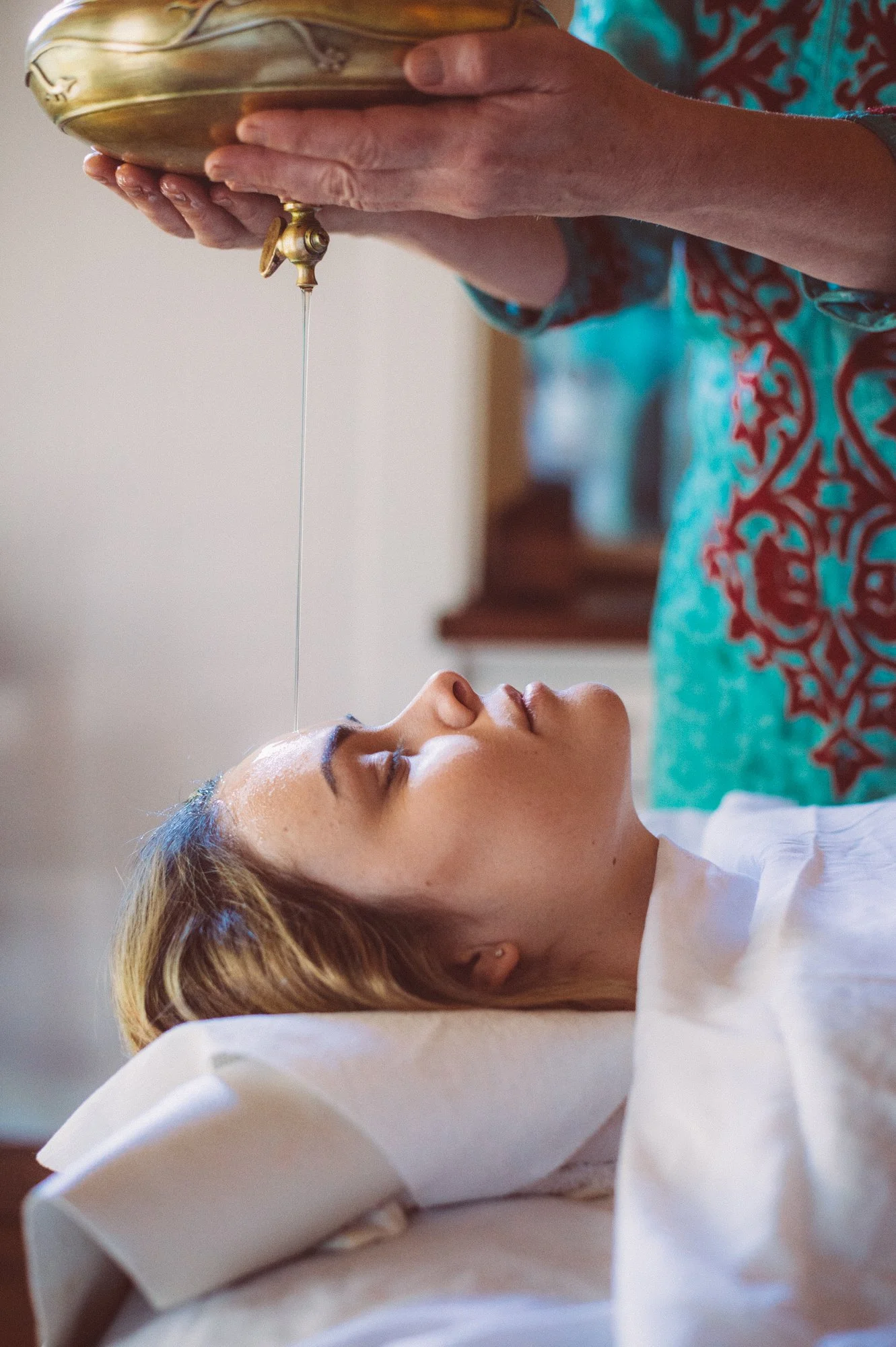 close-up-of-person-getting-a-shirodhara.jpeg