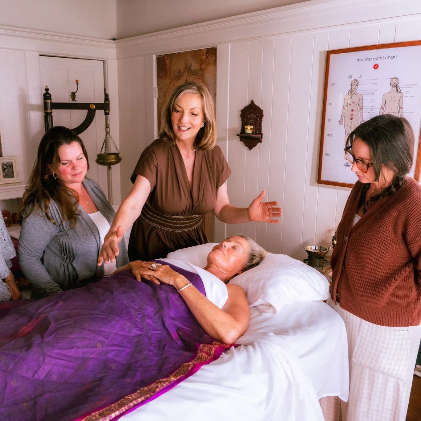Faculty mentoring students during professional Ayurveda certification focused on Marma Therapy and Panchakarma.