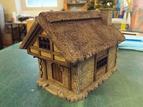 MDF cottage (by LCA. Lasercut Architect ) with custom Styrofoam thatch