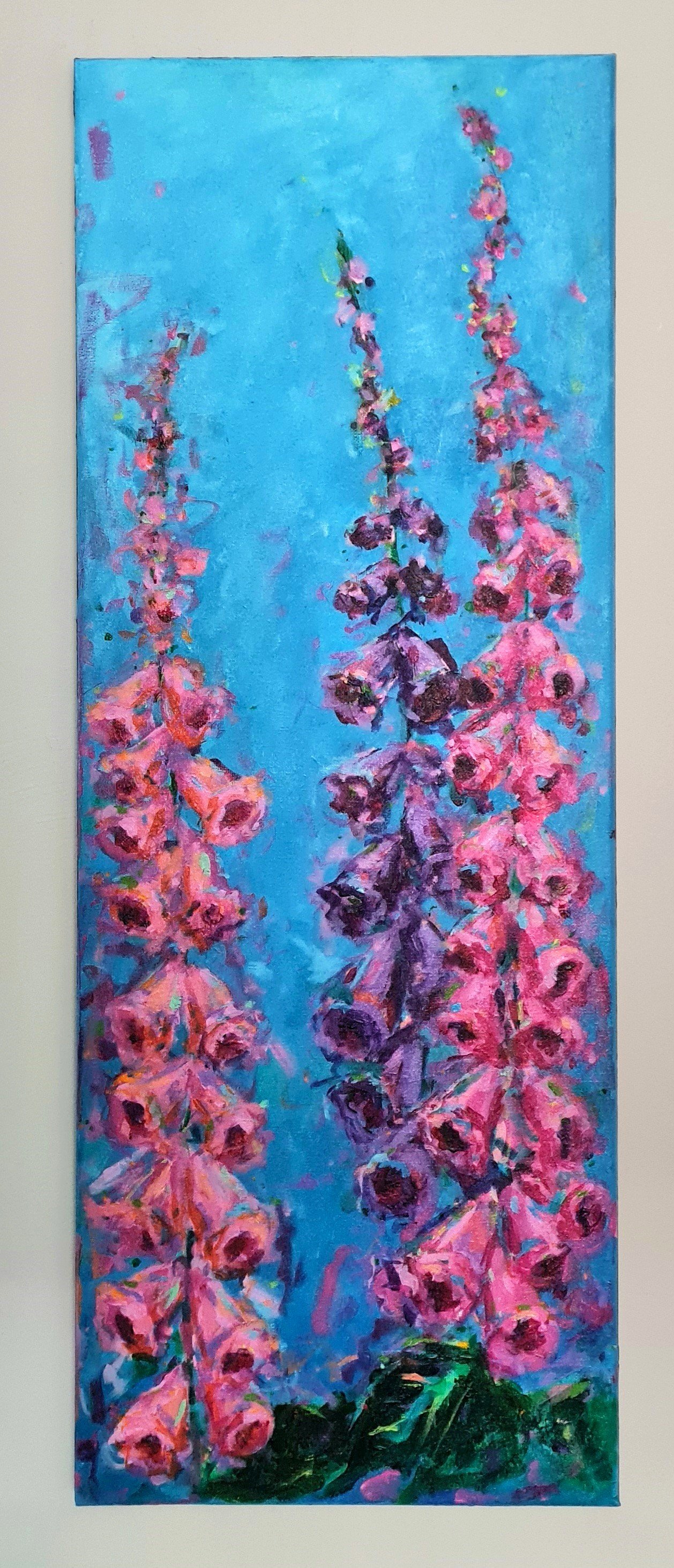 three pink foxgloves