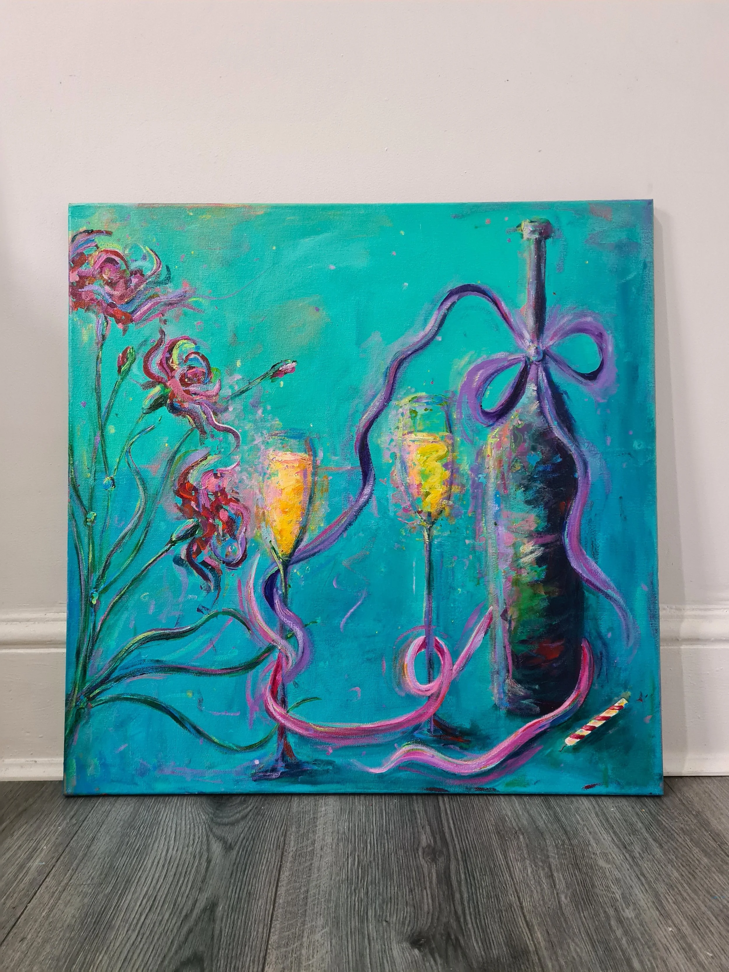 square painting against a white wall