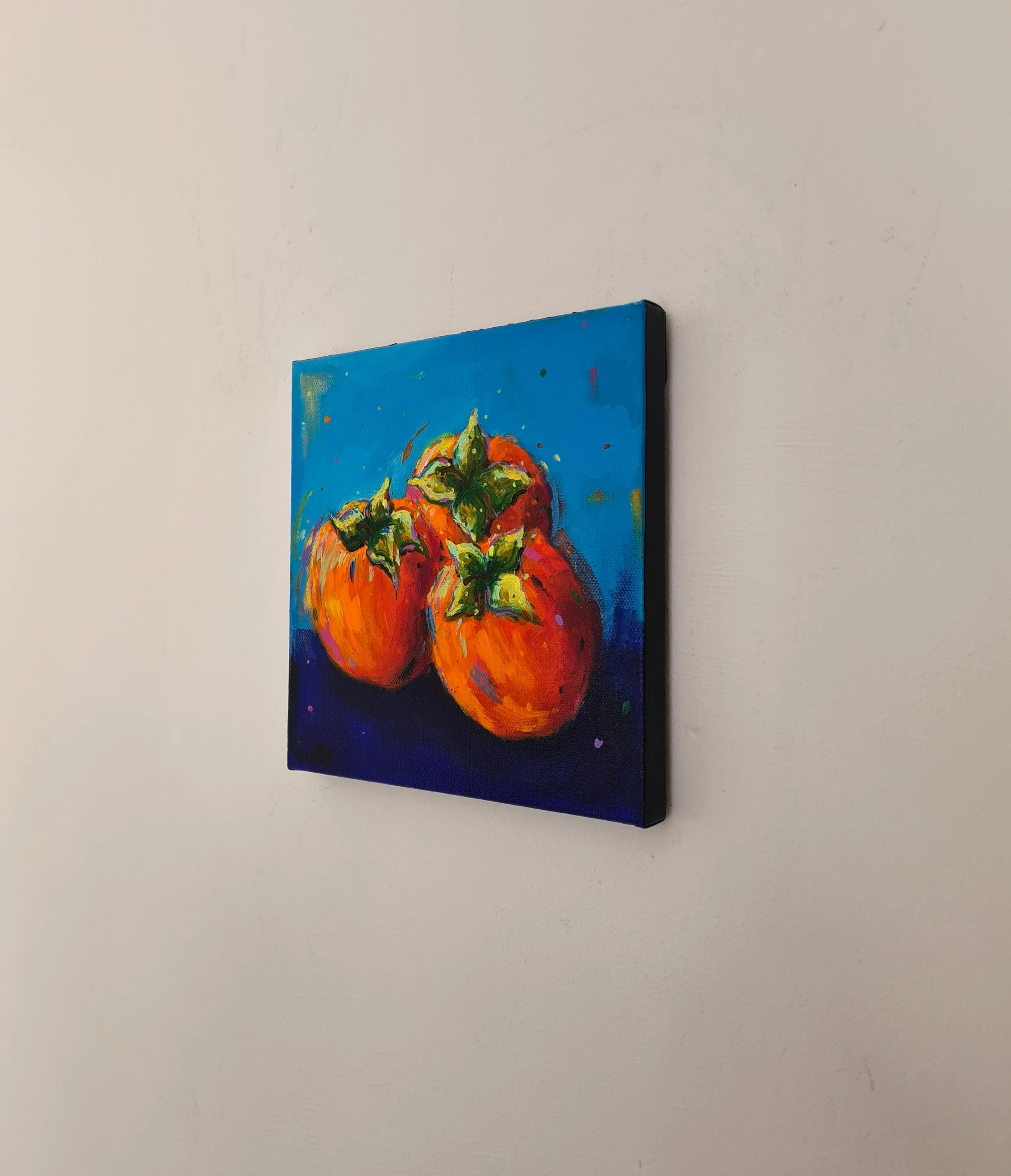side view of a colourful square painting