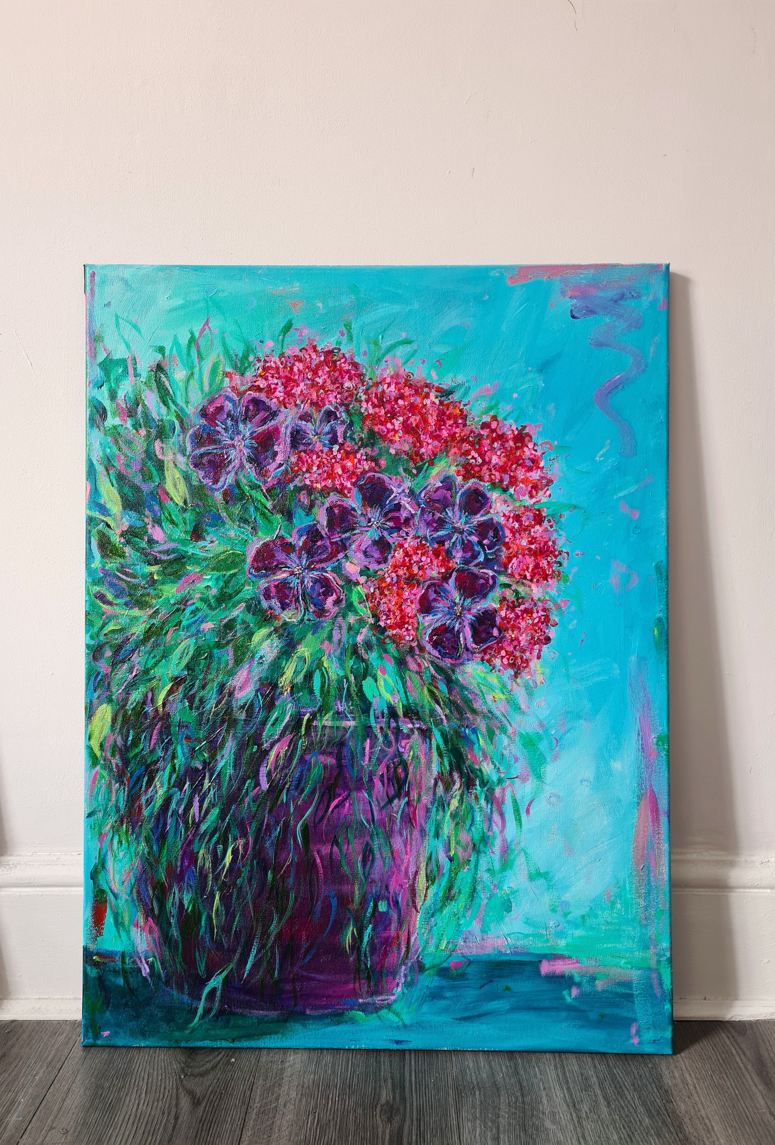 painting of purple and red flowers against a blue background