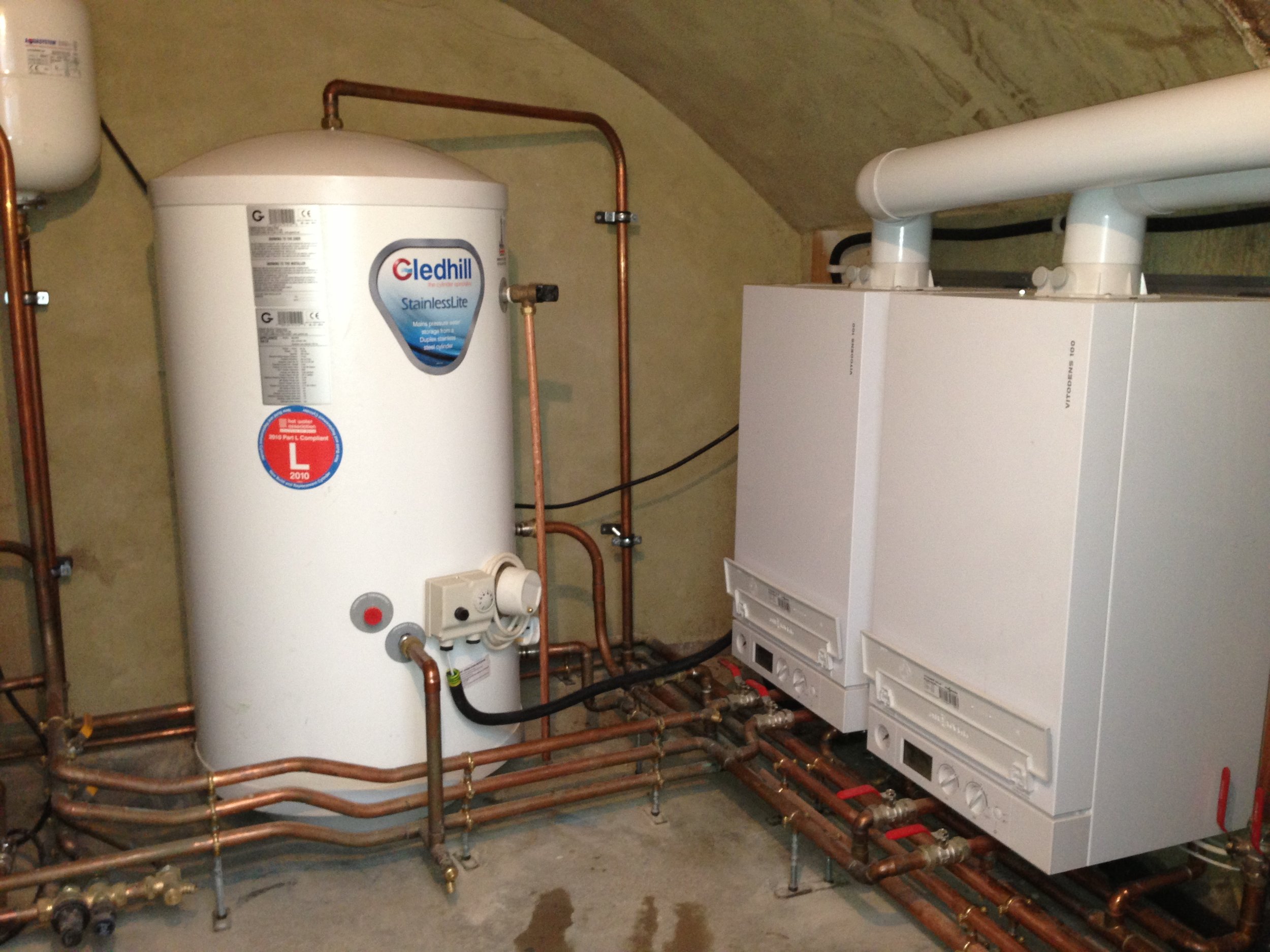 Replacement of two Keston C30 boilers with two Veissmann Vitodens 100w 35kw boilers along with two DHW cylinders and a Grundfos 180l home booster with a 180l slave tank.JPG