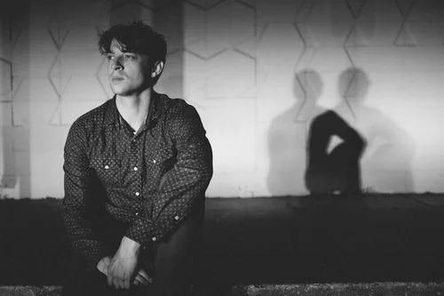Promo photos for Minneapolis musician Chris Koza of Rogue Valley