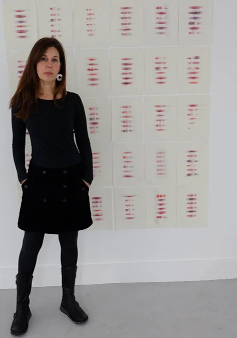 Kate Southworth in front of Installation of 64 Telepathic Moments. Photograph by Neil McLeod
