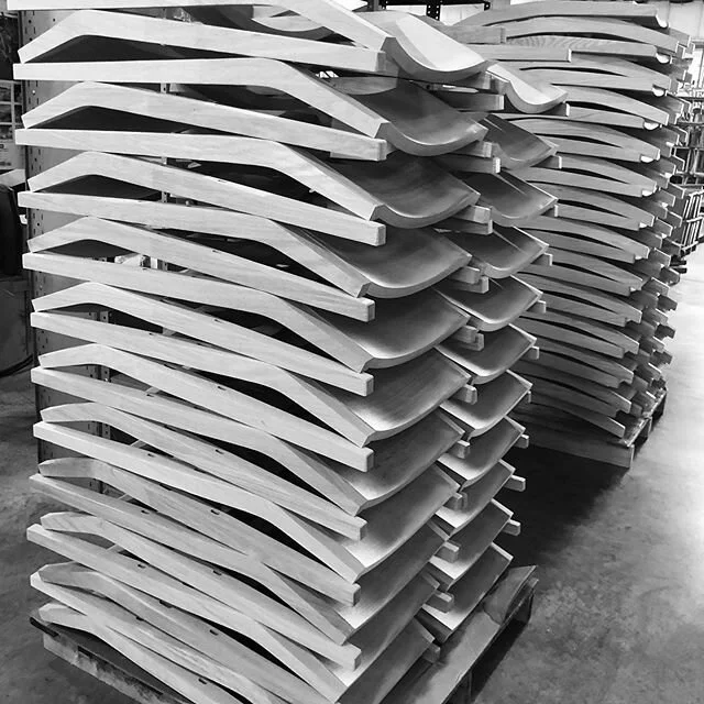 Production run of a custom chair design. Back sub-assemblies glued up.