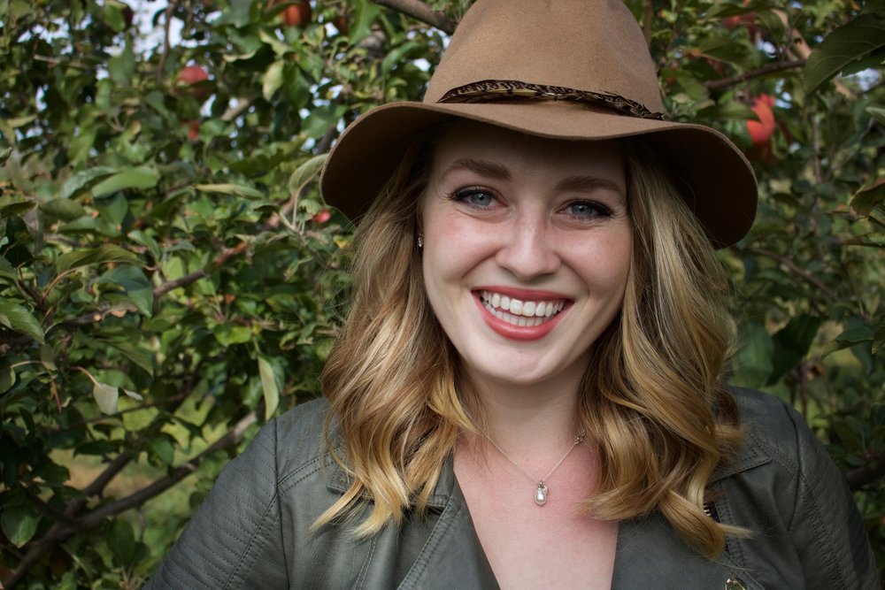 Lauren Cusker with hat.jpg