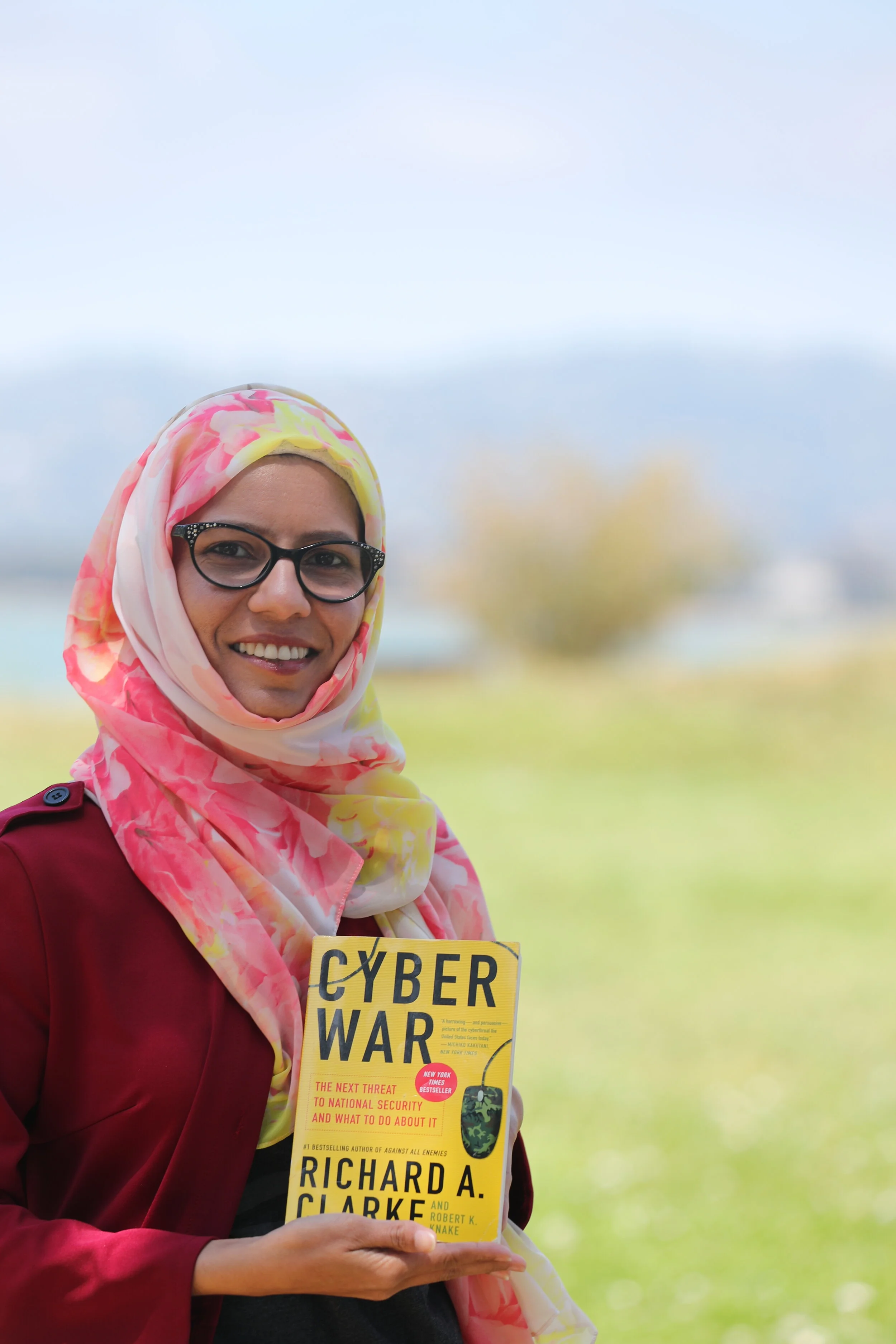 Kavya with Book Cyber War.JPG