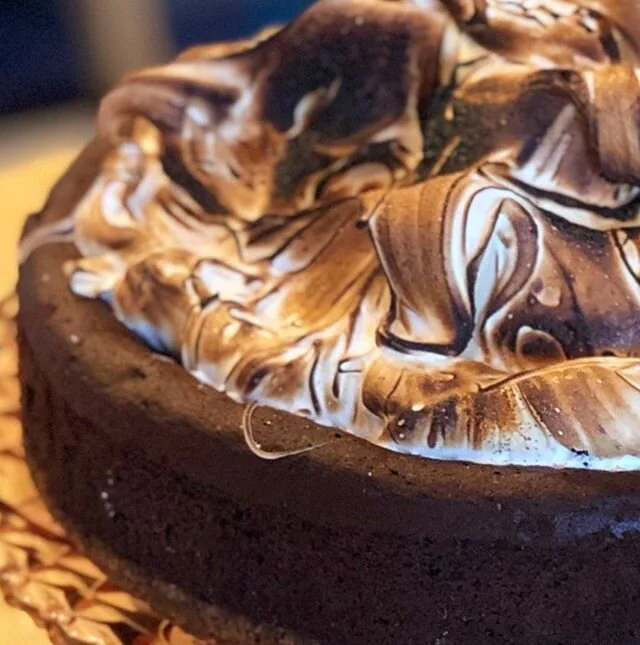 Birthdays are for smore flourless chocolate cake.  Graham cracker crust, rich chocolaty flourless chocolate cake and waves of whipped vanilla bean Swiss meringue all for Anica! Yummy! #ellesbelles #ellesbellesbakery #bozemanbakery #smorecake #montana #glutenfree #birthdaycake