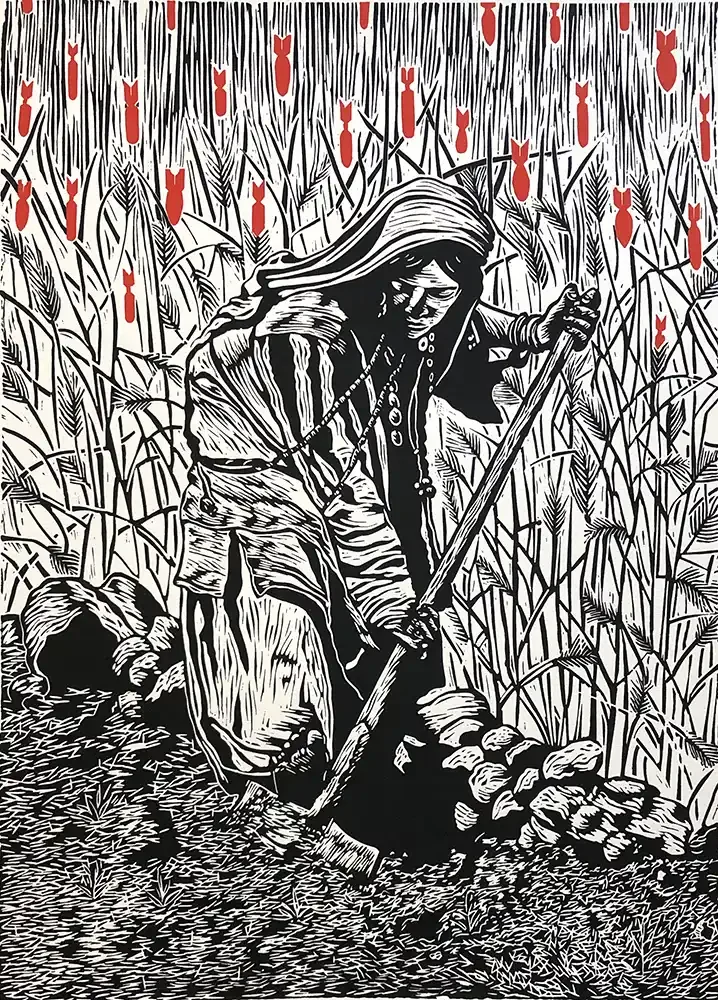 Black-and-white screenprint of a figure digging in a field while red bomb silhouettes fall in the background; artwork by Juan Fuentes.