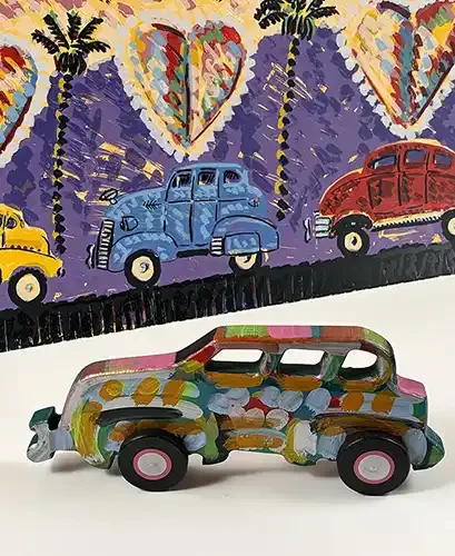 Hand carved Car by Frank Romero