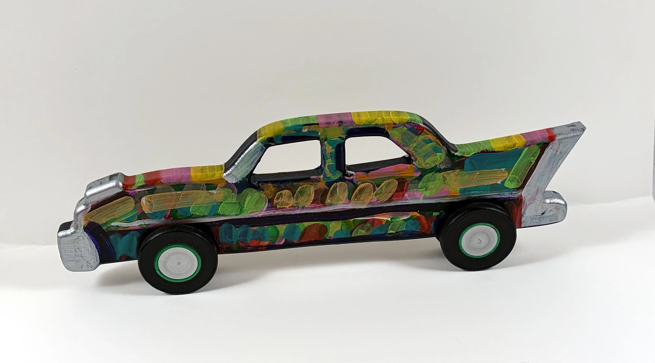 frank-romero-two-window-carved-car-front.jpg