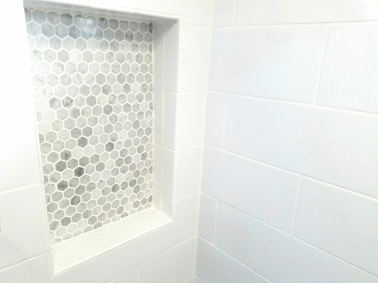 Shampoo niche with mosaic tile.jpg