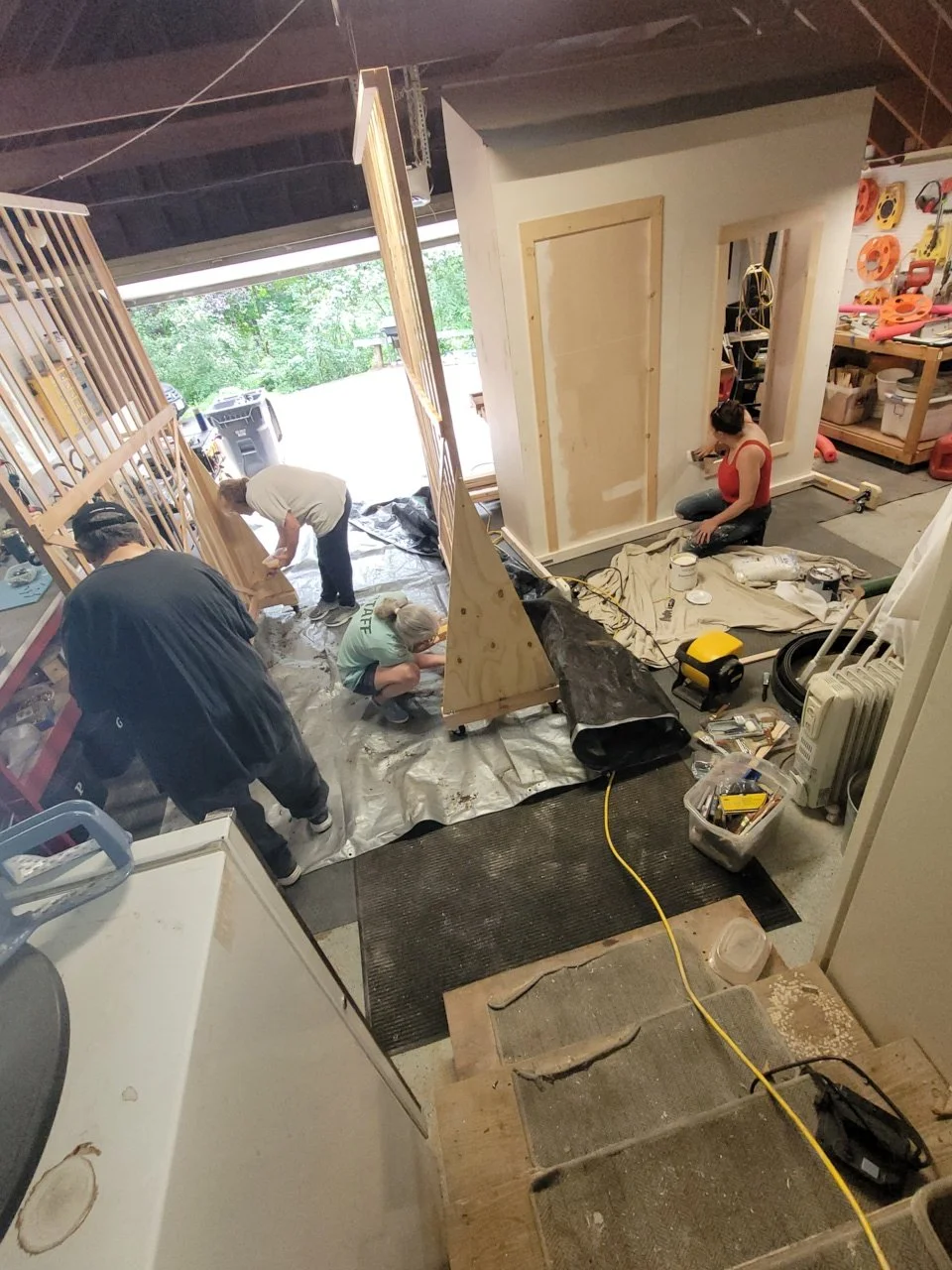 CAST's builders and artists creating a Kansas farmhouse and the Merry Old Land of Oz