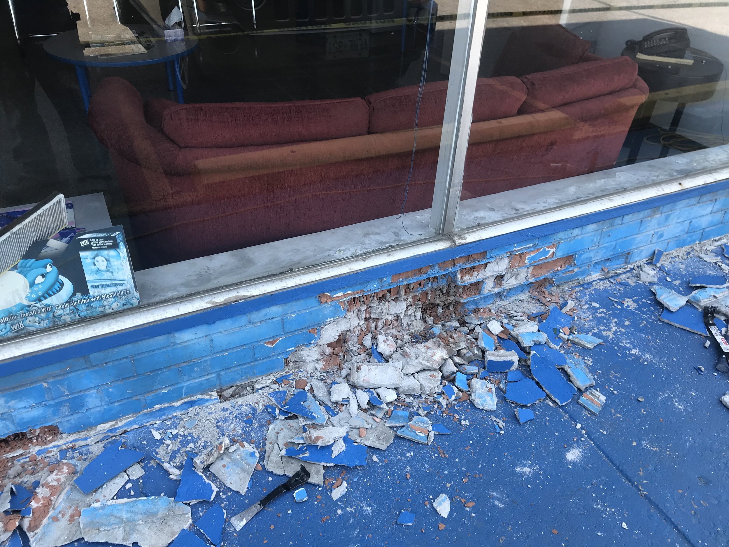  Damaged Brick on Exterior Wall Before Repair 