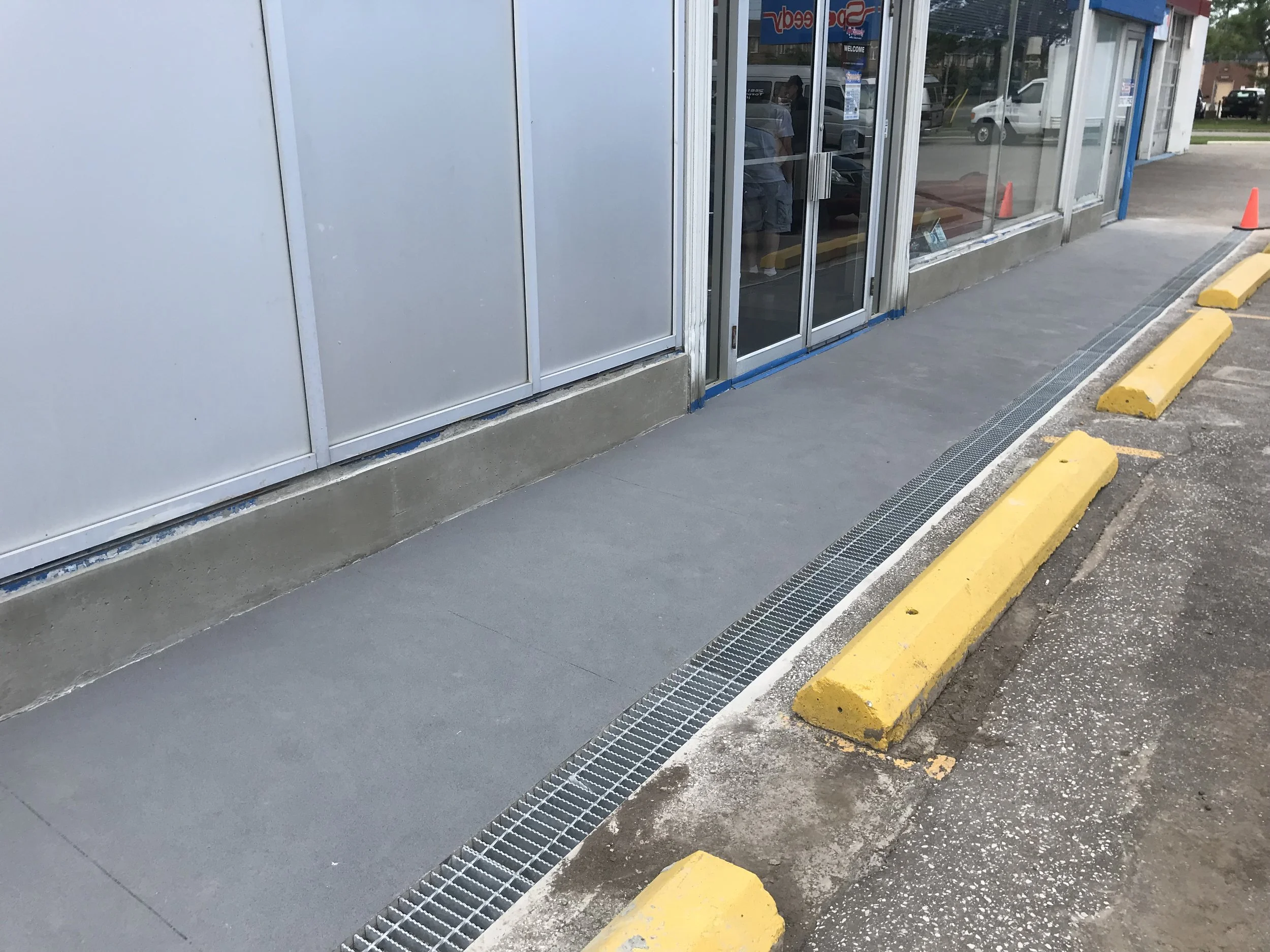  Brick Repair Complete w/ Concrete Sidewalk and Drainage System 