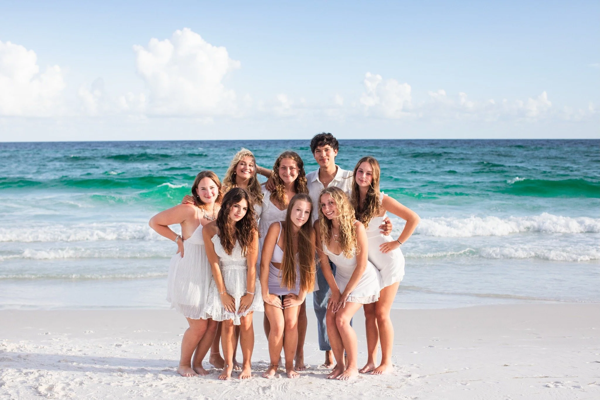 I remember that day I took 8 seniors portraits in 1 hour on the most windiest, cold and sunny day. It was challenging but luckily I  am used to this crazy weather that I can take my L's and turn them to wins no matter what. Check out their group phot