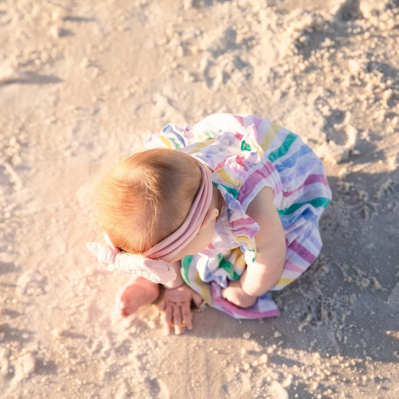 Life is in all the little details. I don't want to miss none of them. Those tiny toes touching the sand for the first time, this sweet eyes sparkling with the morning sunshine and that soft giggle as the sea breeze fills the air. 

Jessica Salort Pho