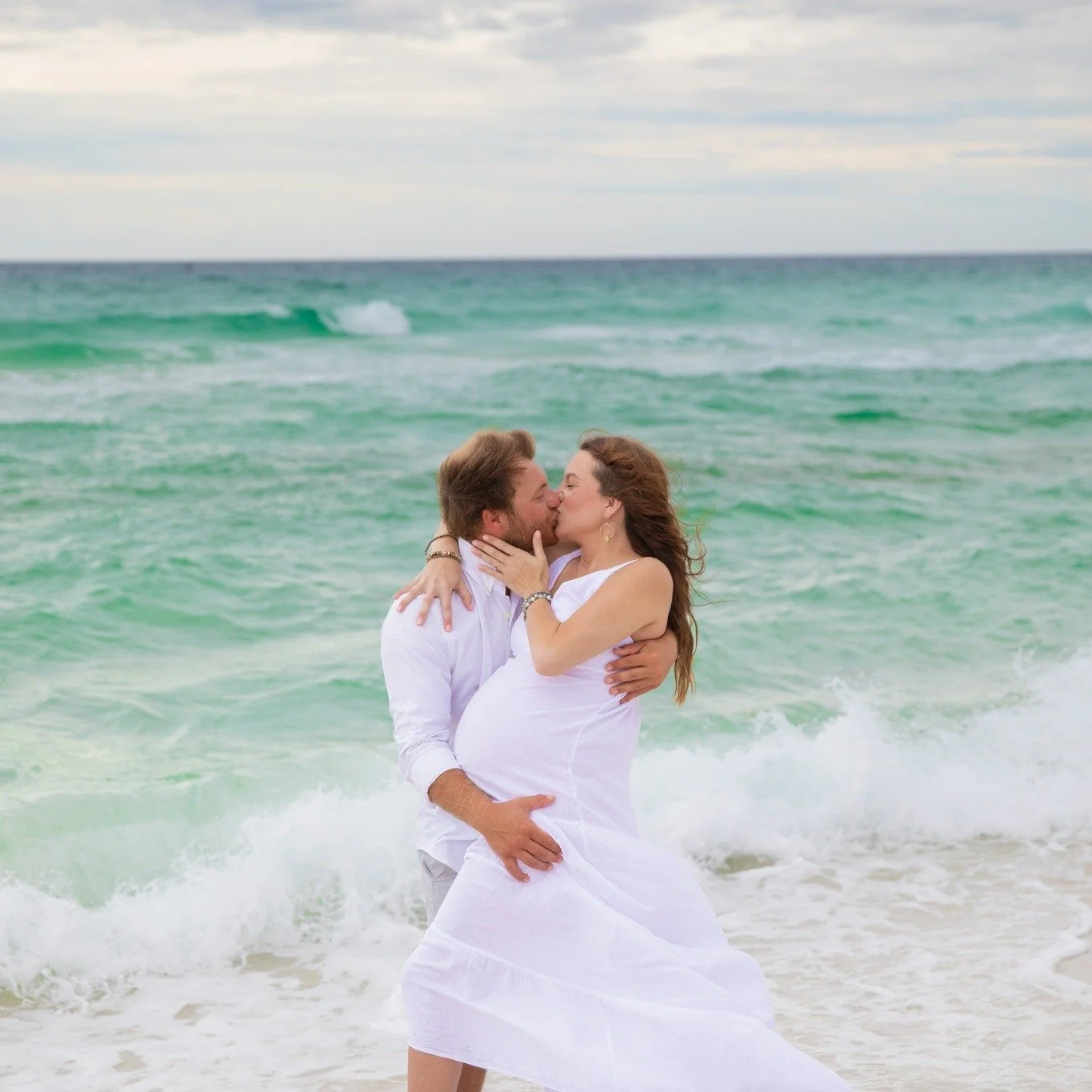 When the wind actually works in your favor! ✨

Some of the most romantic photos happen when the beach doesn't go exactly as planned. Windy hair, flowing dresses, and genuine connection create magic that can't be staged.
No matter the weather or beach