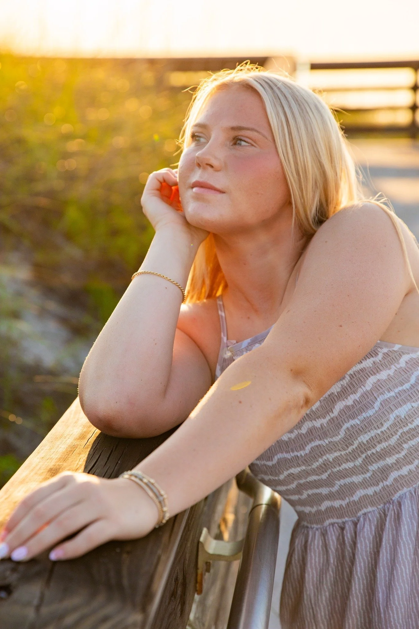 Senior photos don't have to look like everyone else's.
If you're vacationing in Navarre Beach, why not capture your senior portraits somewhere unforgettable? Trade the same old backdrops for white sand, emerald water, golden sunsets, and photos that 