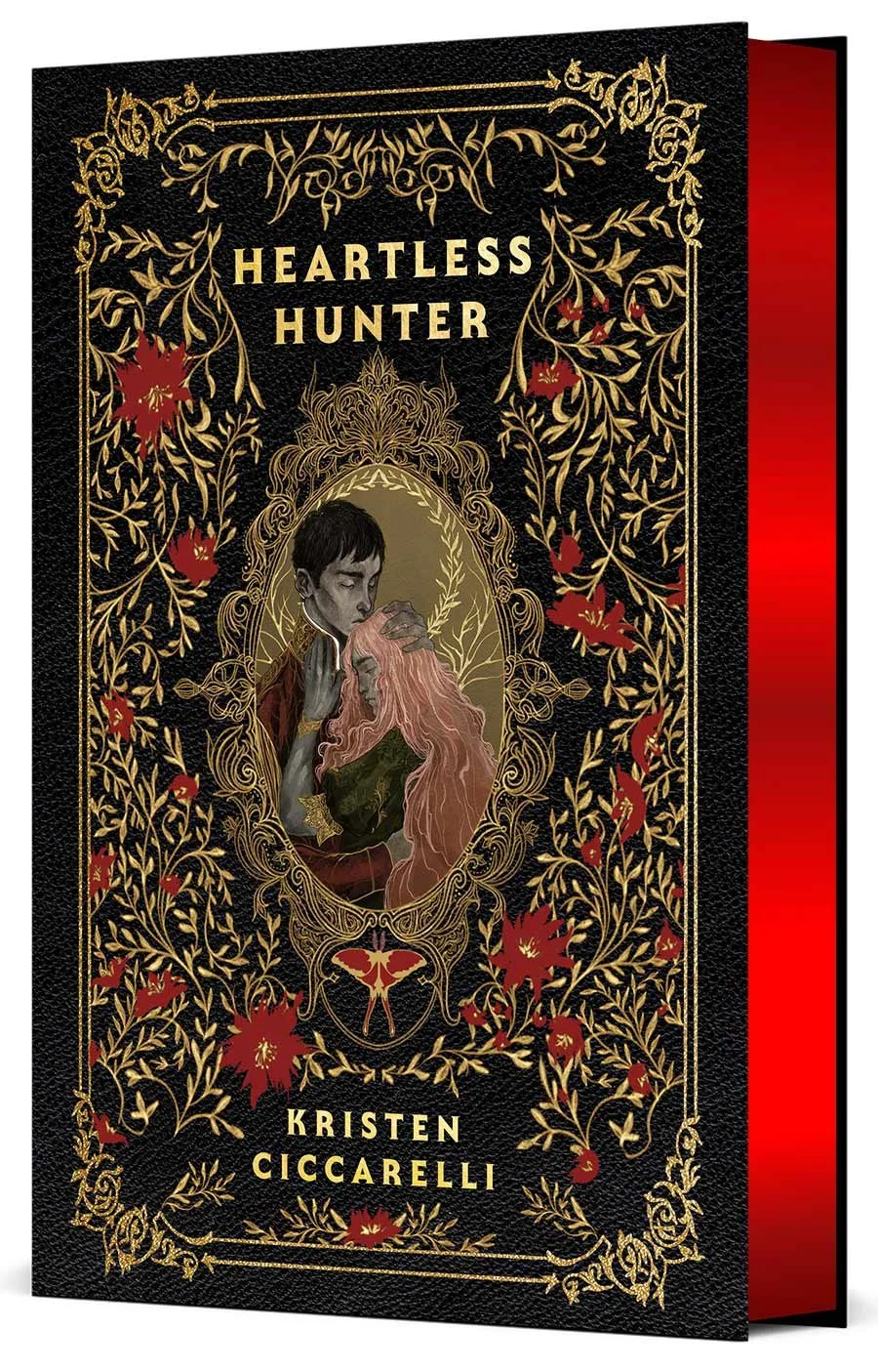 Heartless Hunter Collector's Edition by Kristen Ciccarelli, with a black and gold floral cover and red gilded page edges.