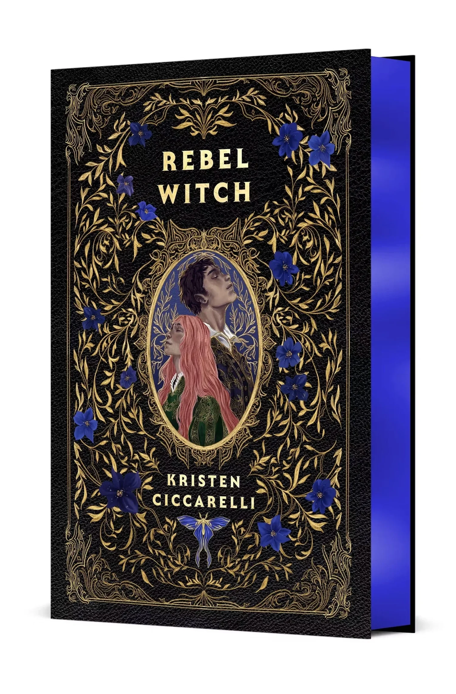 Rebel Witch Collector's Edition by Kristen Ciccarelli, with a black and gold floral cover and blue gilded page edges