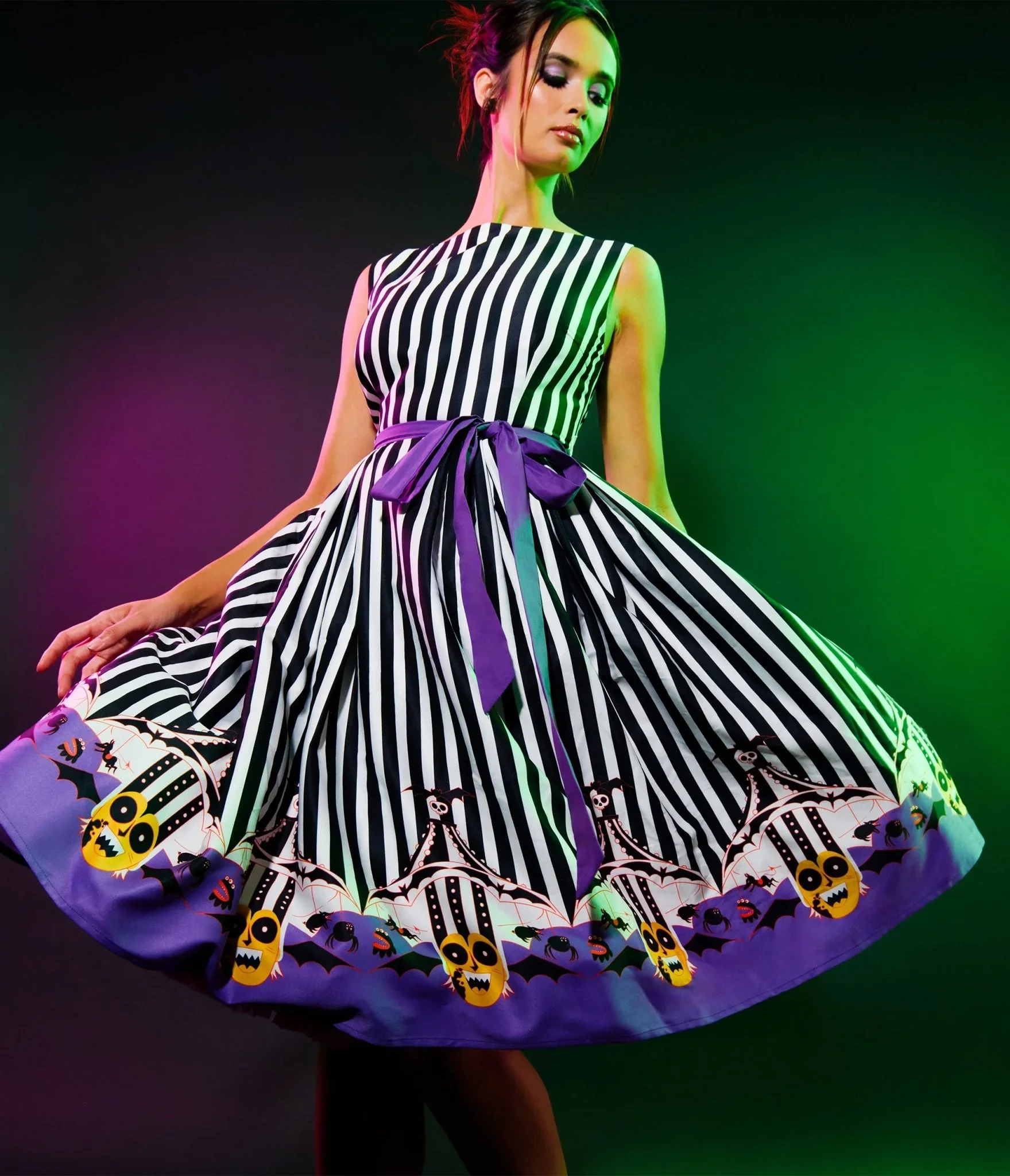 beetlejuice-x-unique-vintage-black-white-striped-beetlejuice-border-print-sleeveless-swing-dress-9697968.jpg.webp