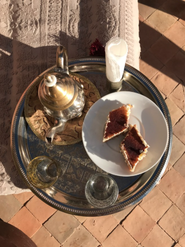 Delicious afternoon tea and cake served on traditional Moroccan silver trays at Dar Zemora.