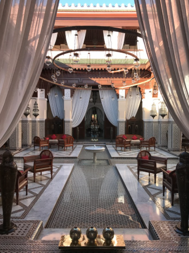 A view of the formal entry to Royal Mansour Marrakech, a hotel and spa just a short walk from the Medina. Commissioned by King Mohammed VI in 2010, he often hosts his guests in one of the 53 private riads, situated amongst the lush gardens.