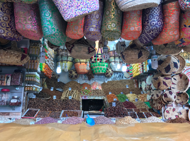  A view of the markets within the Medina. The Jemaa el-Fna is home to numerous vendors selling everything from woven bags, ceramics, wooden crafts, and leather goods, to nuts, dried fruits and spices. 