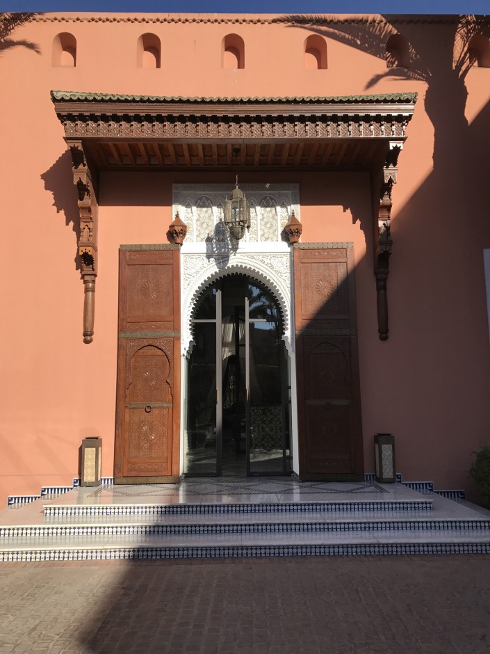  “Playing in the sun and admiring the doorways at Royal Mansour.” 