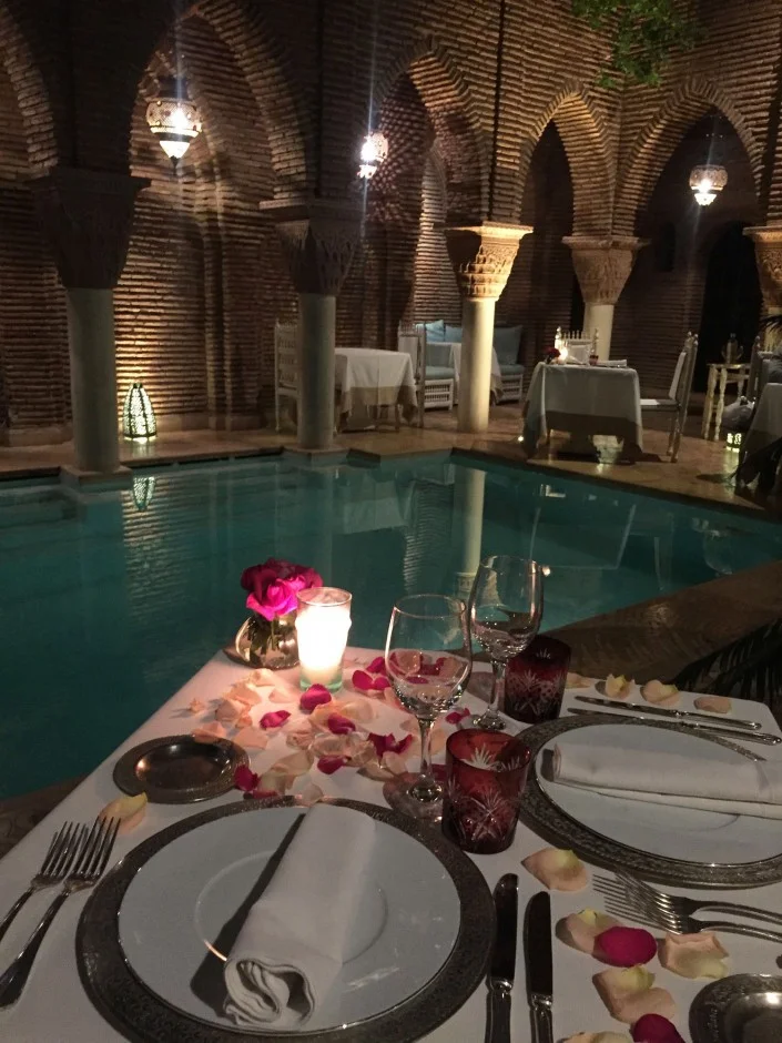 “Only Moroccans love roses more than we do. This was the setting for dinner in our hotel by the pool. The ceiling is open, revealing a night sky with candles and soft string music echoing throughout the Riad.”