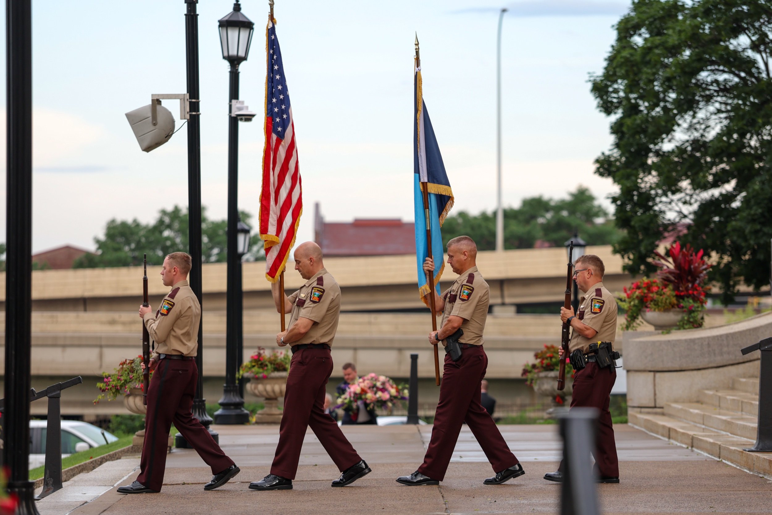 A honor guard from the Minnesota State Patrol marches outside before a funeral service for DFL Rep. Melissa Hortman and her husband Mark Hortman at the Basilica of Saint Mary on June 28, 2025 in Minneapolis, Minnesota.