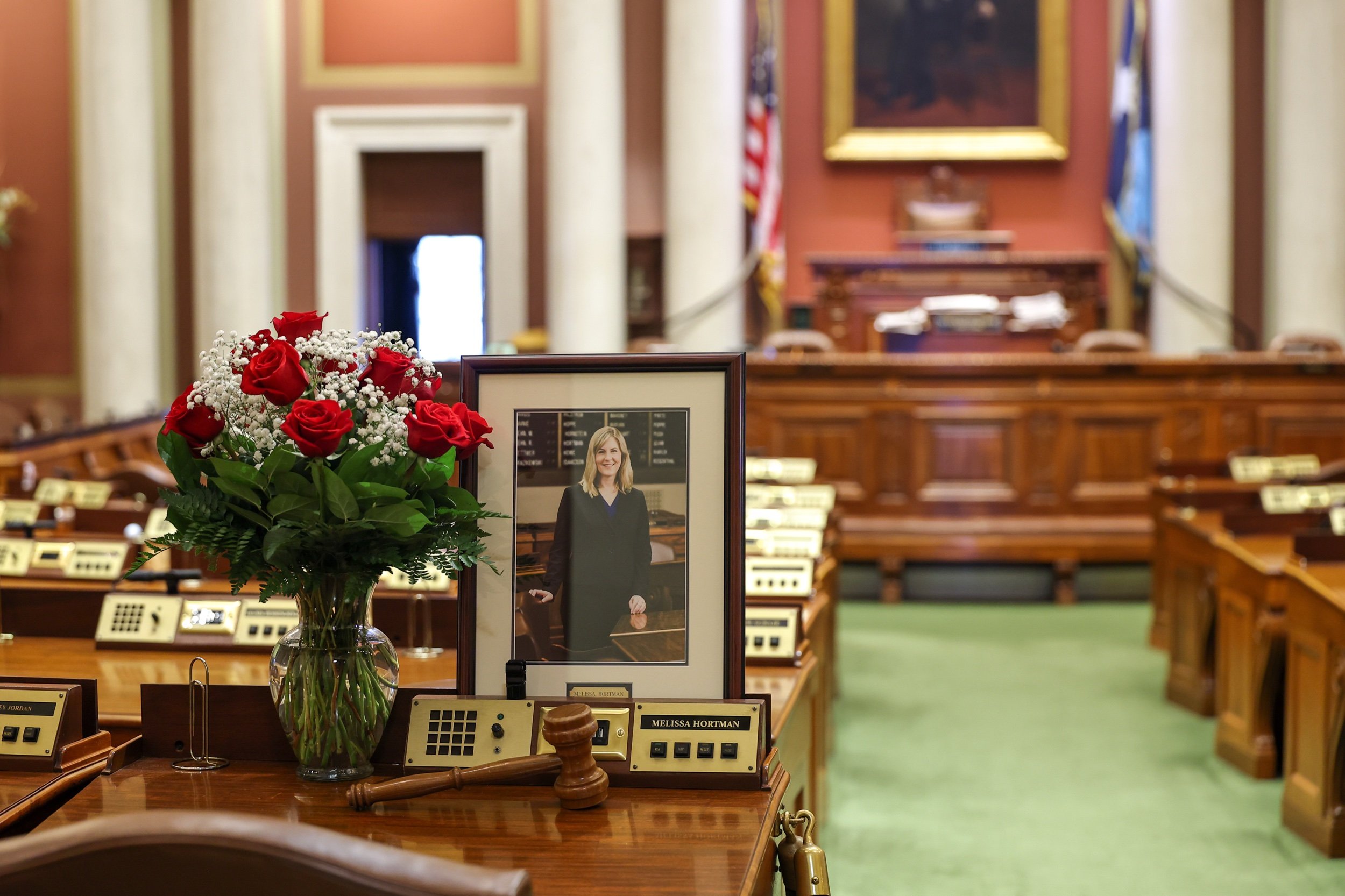 ST PAUL, MINNESOTA - JUNE 16: A memorial is seen on the desk of DFL State Rep. Melissa Hortman in the House chambers at the Minnesota State Capitol on June 16, 2025 in St. Paul, Minnesota. (Steven Garcia/Getty Images)