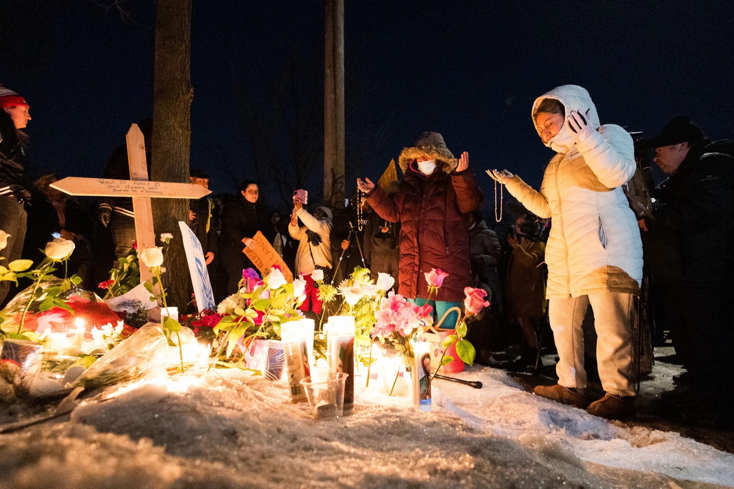  People gather for a vigil and protest for Renee Nicole Good near the intersection of East 34th Street and Portland Avenue on January 07, 2026 in Minneapolis, Minnesota. 37 year old Renee Nicole Good was killed by an ICE officer during a confrontatio