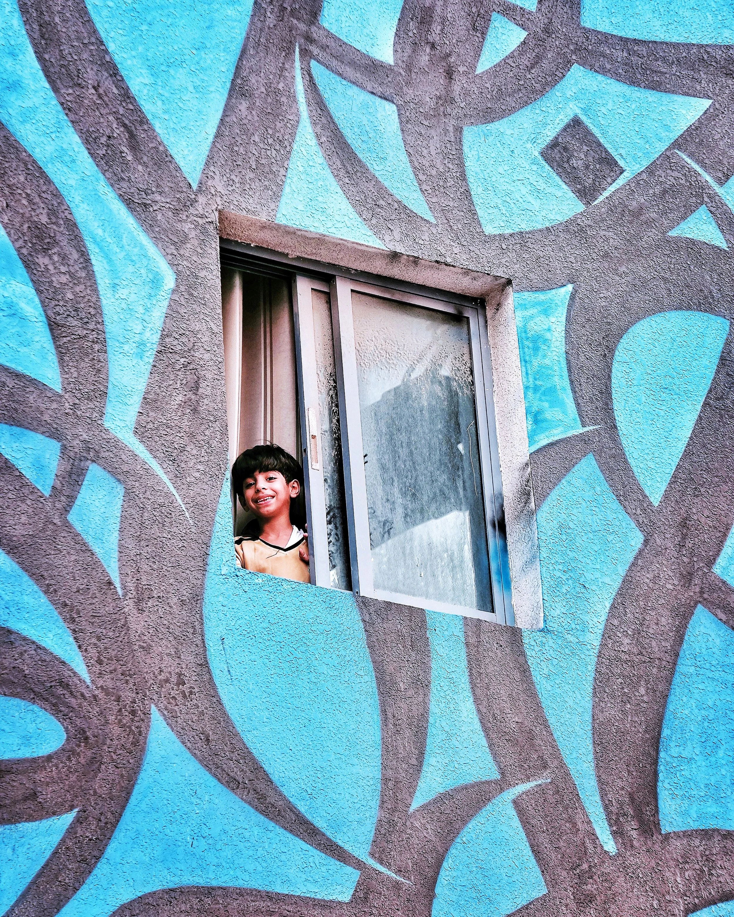 eL Seed unveils a new wall mural in Ajman, UAE