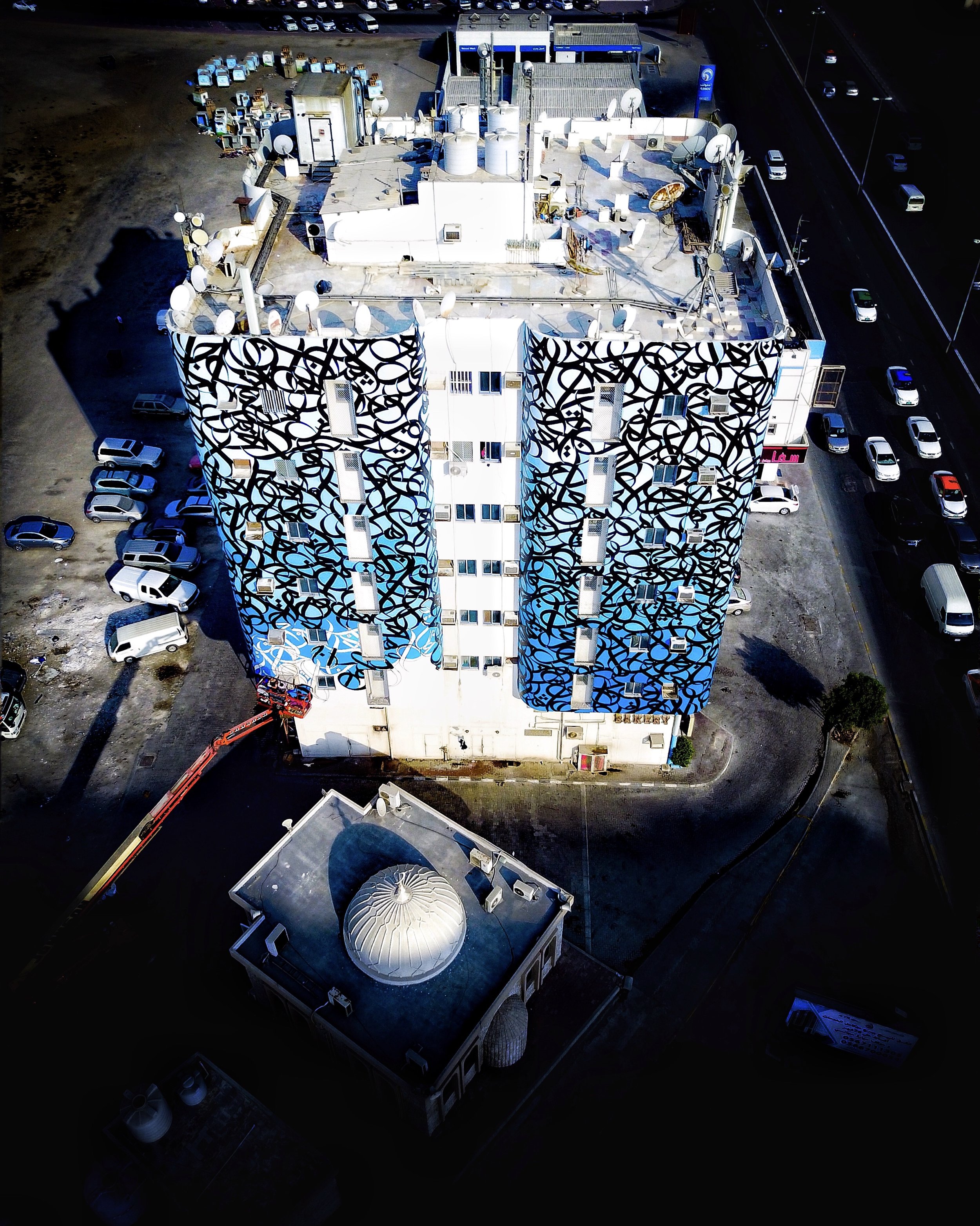 Aerial view of the building at the junction of Badr and Al Ittihad Streets in Ajman's Al Bustan neighbourhood. Image courtesy of ALJVD Photography.