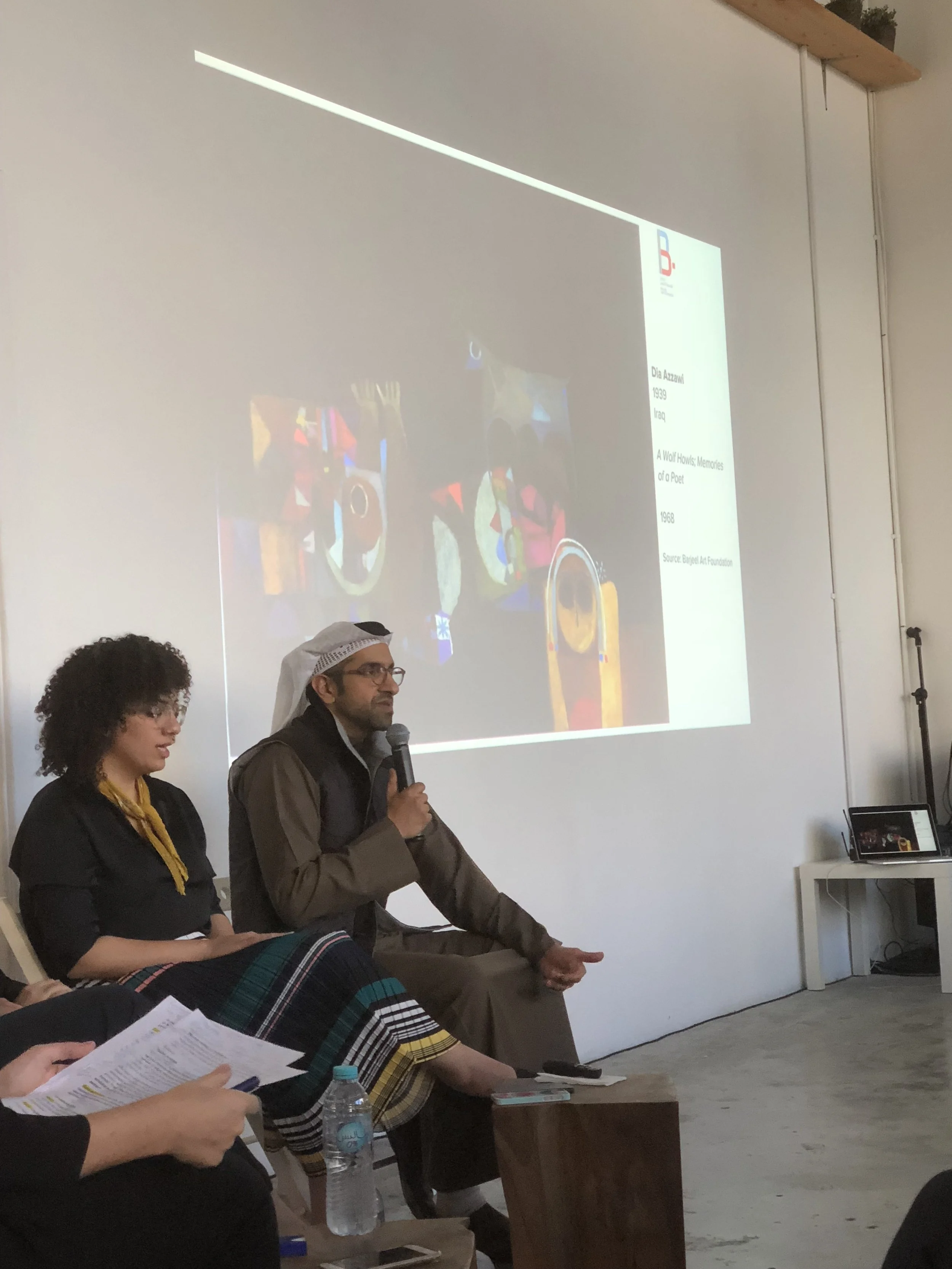 Sultan Sooud Al Qassemi reveals his latest acquisition to audiences at a panel discussion in Alserkal Avenue. The image is Dia Azzawi's A Wolf Howls: Memories of a Poet (1968)