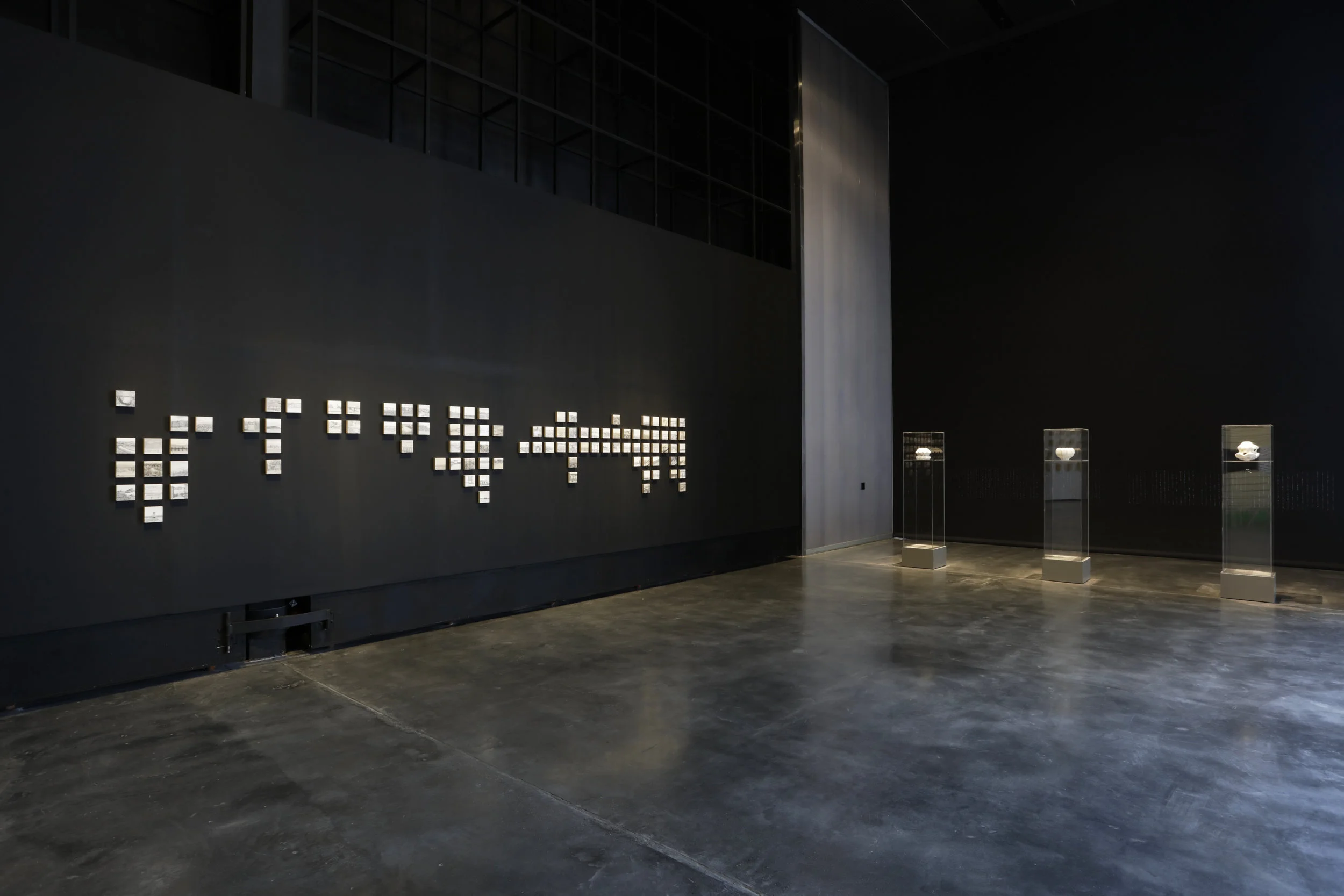 Ishara: Signs, Symbols and Shared Languages (installation view). Visible on the left is Saba Qizilbash’s Land Marks (2018) and on the right, Salem Al Mansoori's Going Inside, In The Dictionary and Body Language2018 Courtesy UAE Unlimited and Alserkal Programming.