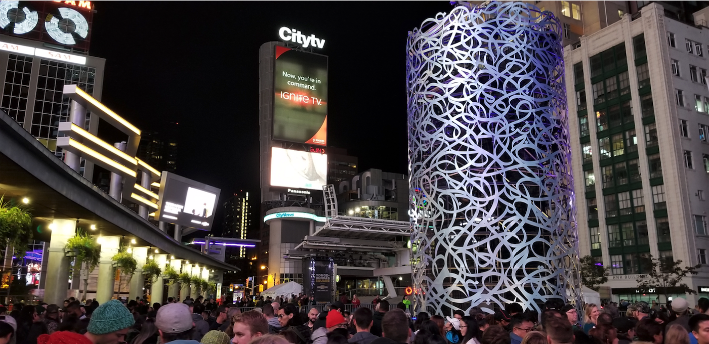 Yonge-Dundas Square in Toronto as part of the annual Nuit Blanche celebrations. eL Seed’s towering Mirrors of Babel sculpture represents the plurality of the city. Courtesy eL Seed Studio.