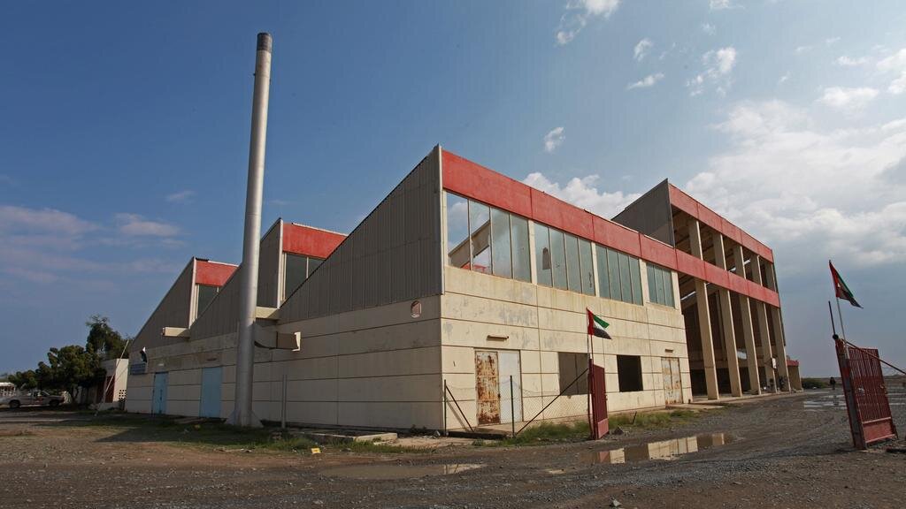 Kalba Ice Factory stands as an abandoned building on the shores of Kalba Creek. Its dilapidated state and pigeon inhabitants only adds to the artistic experience.