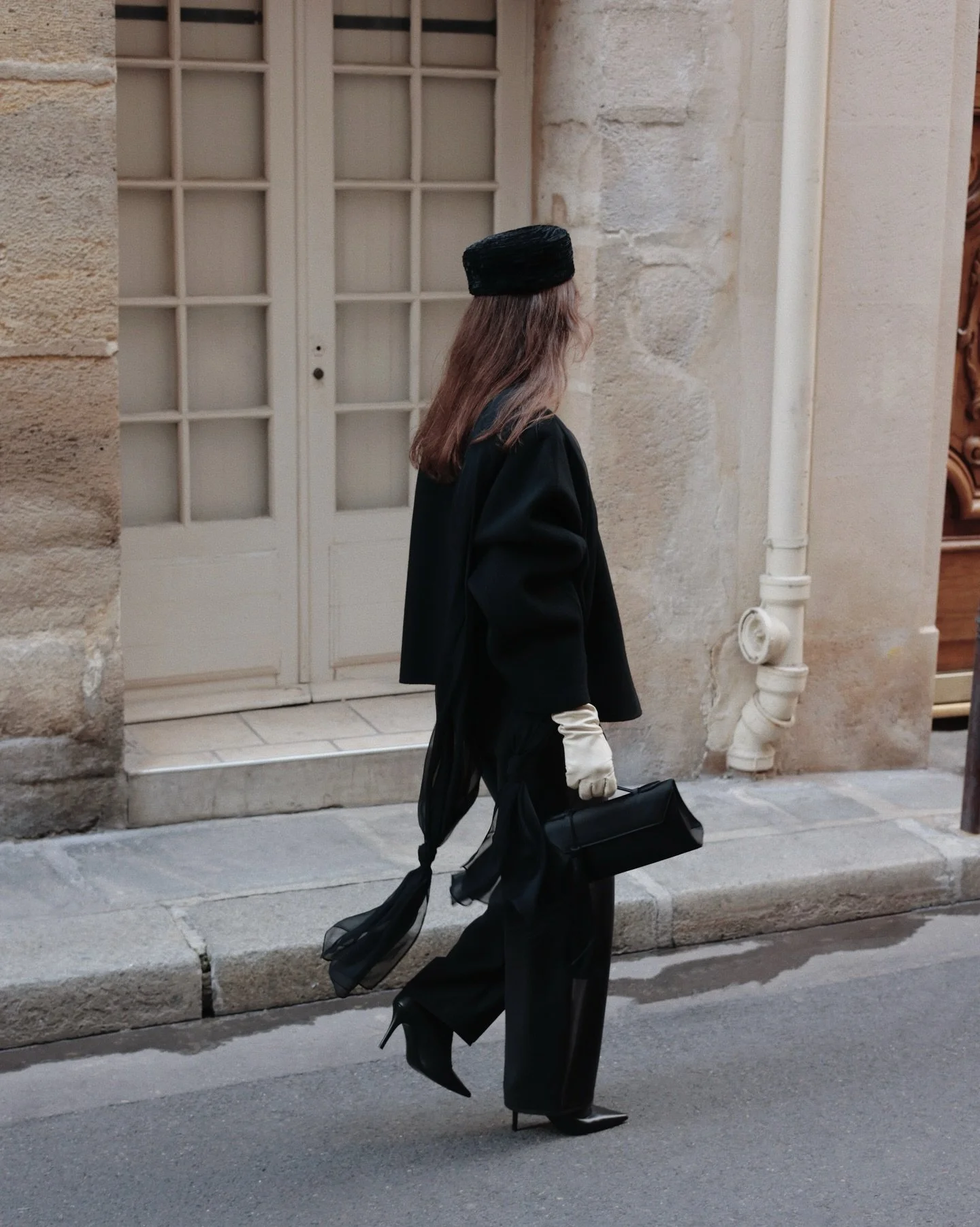 All black, quiet statement details.