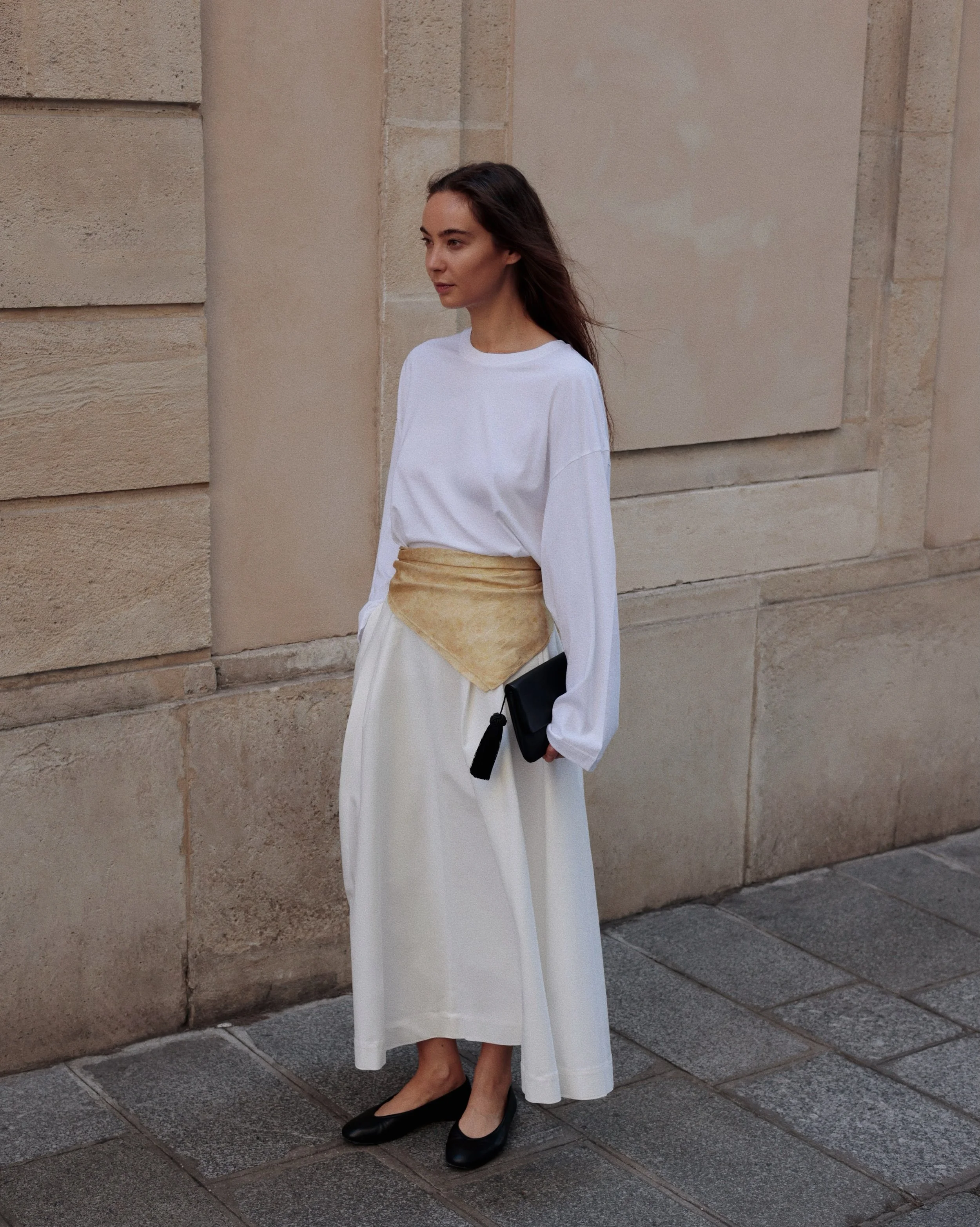 All white, softened by silk.