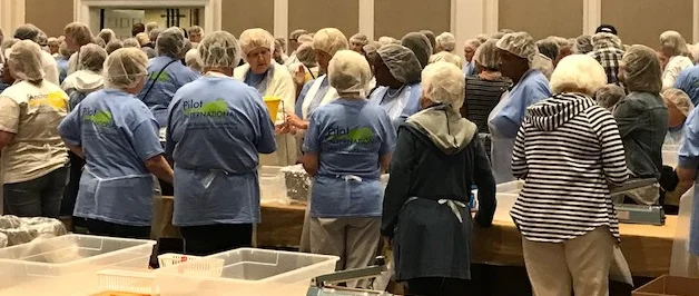Most Pilot at the convention participated in this wonderful project to package 30,000 bags of food for underprivileged children in the Nashville and Knoxville area. Precise amounts of rice, soy, dried vegetables and a vitamin packet were placed in the plastic bags, weighed, sealed and placed in boxes with the expiration date.
