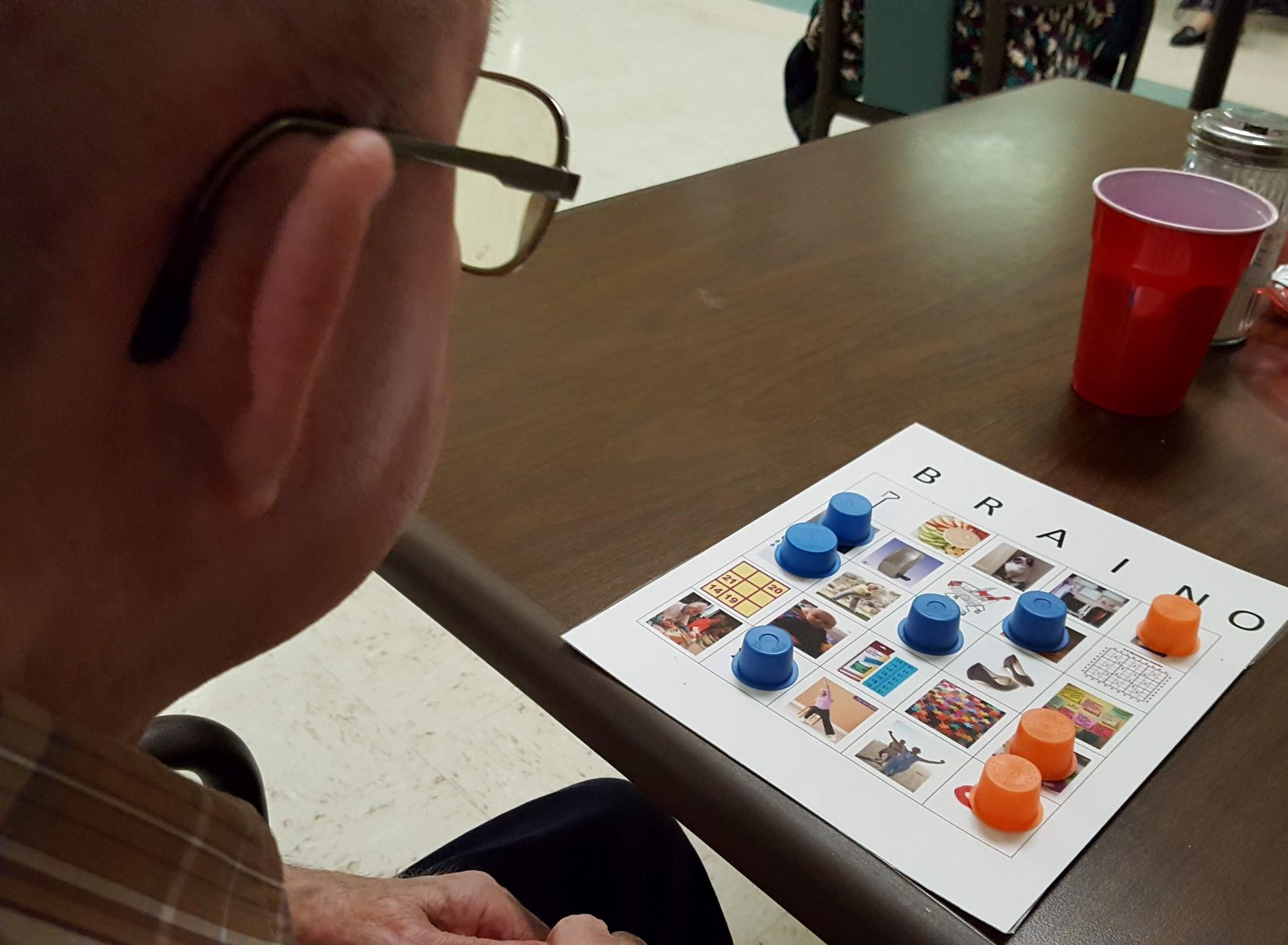 On March 15, 2019 James, a resident at Great Bend Health & Rehabilitation Center, played Brain-O Bingo with Pilot Club. Note the pictures on his card instead of numbers.