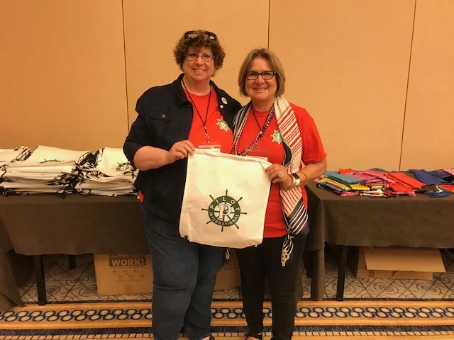 Rhonda Knudson (President-elect Great Bend Pilot Club) and Faye Kuhn (Govenor of Heartland District Pilot CLub) participated in the service project (Cradle to Crayons) at PI Convention which will benefit the children in Chicago that are at risk and unable to afford school supplies. Eaach student will be given a bag filled with supplies with the Pilot Club logo on it (a ship’s wheel).