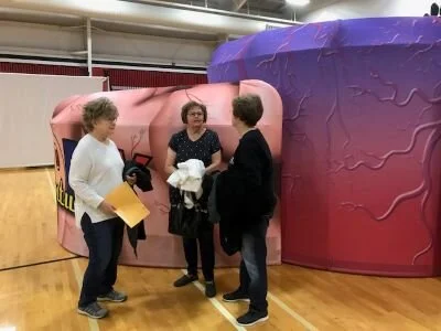 Joyce Beadles-Fry, Sharon Mauler and Nancy Schuetz visit prior to doing the Body Venture presentations.