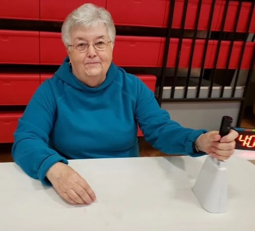 Jari Marietta rings the bell every 5 minutes to let the students & presentors know it is time to proceed to the next station. It takes each group of students about an hour to complete the Body Venture journey.
