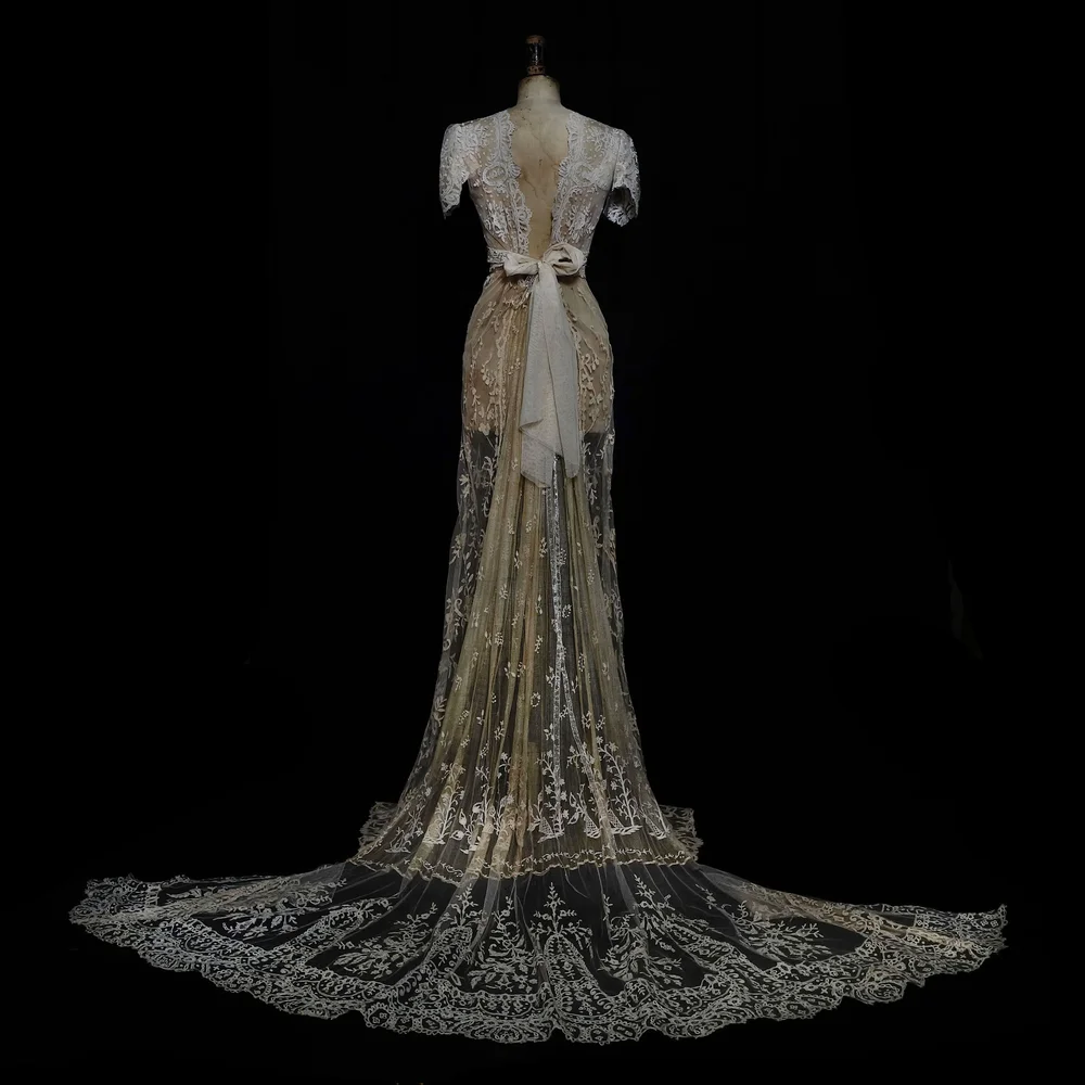 Fine Lace Gown with Gathered Back and Intricate Details jane bourvis Fine Lace Gown with Gathered Back and Intricate Details jane bourvis